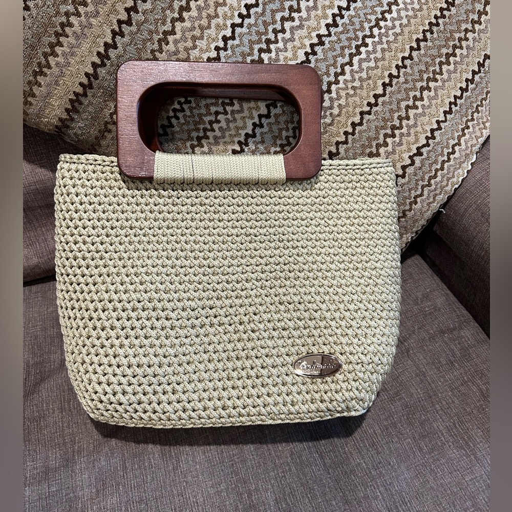 Handcrafted handbag, crocheted with wooden handles.  Tan nylon. NEW, never used.
